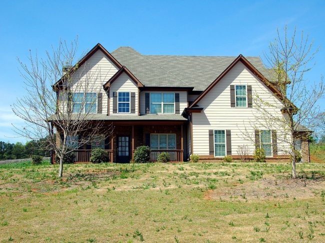 house with siding and tan and brown